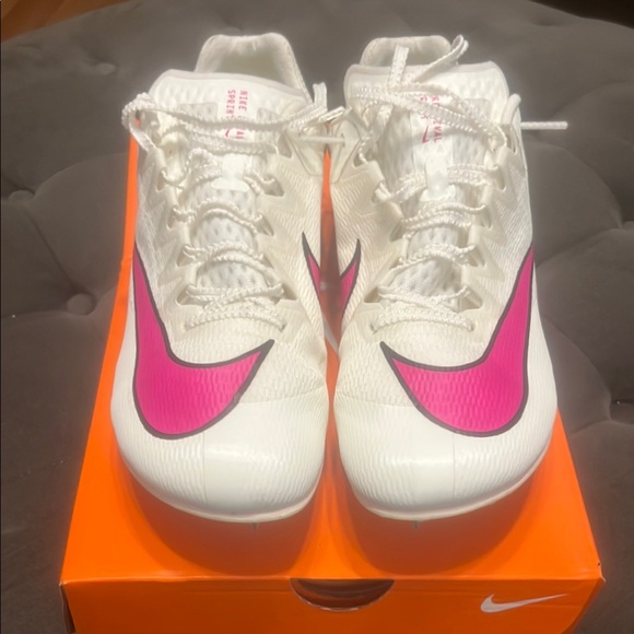 Nike Shoes - Nike White and Pink Athletic Shoes Sleek Design